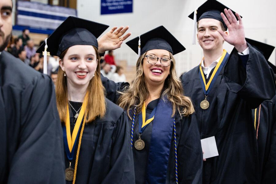 Graduates celebrating their achievement at December Commencement 2024.
