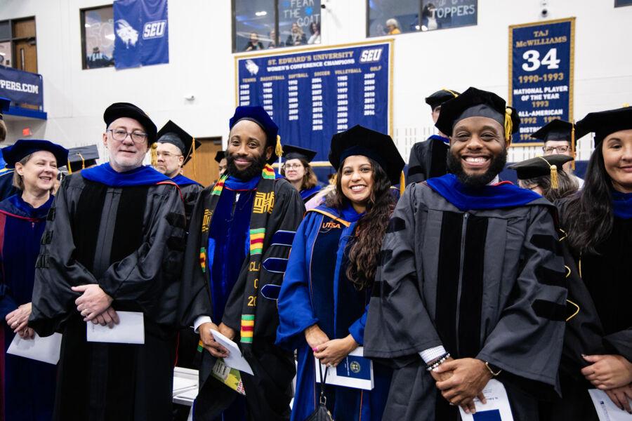Graduates celebrating their achievement at December Commencement 2024.