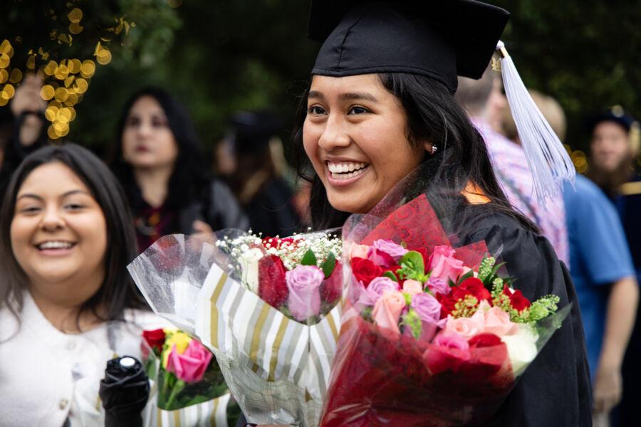 Graduates celebrating their achievement at December Commencement 2024.