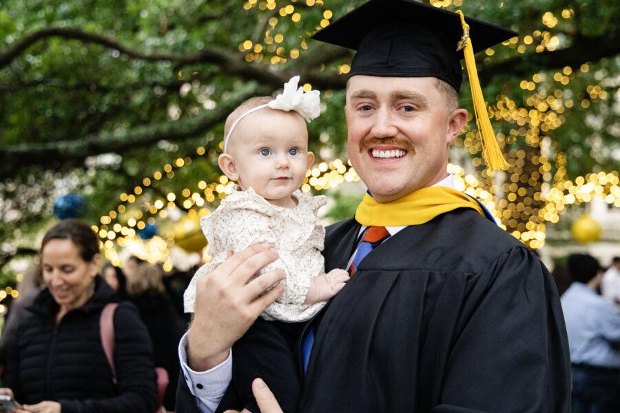 Graduates celebrating their achievement at December Commencement 2024.