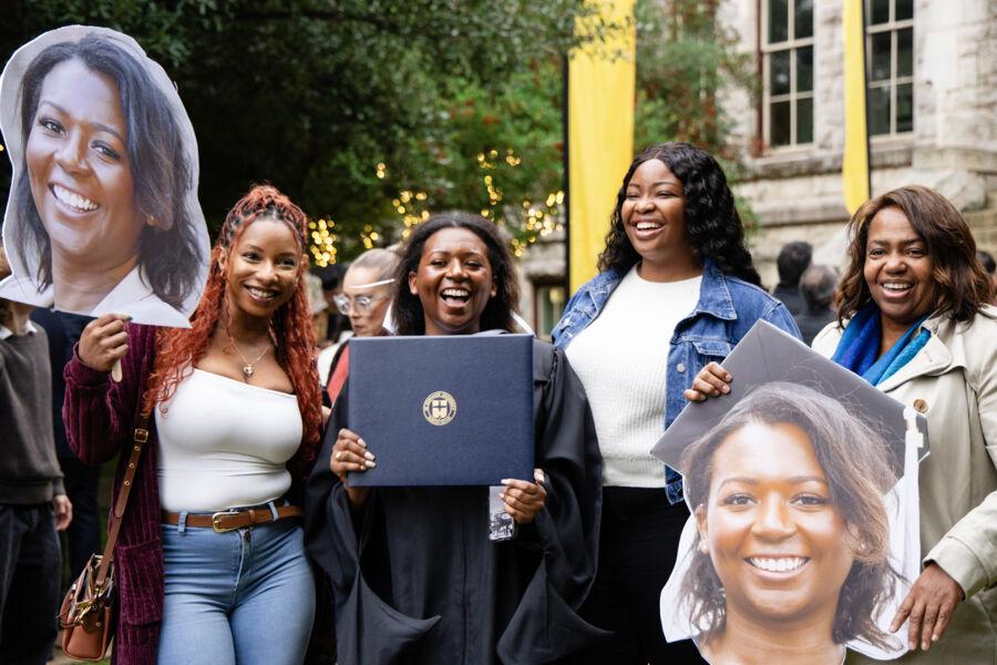 Graduates celebrating their achievement at December Commencement 2024.