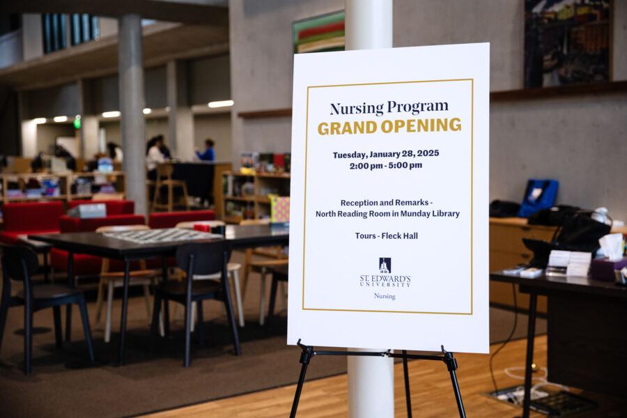 Sign promoting the reception for the grand opening for the Nursing program in the Munday Library.