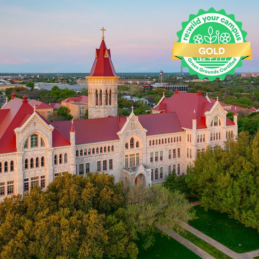 Main Building with the Green Grounds Gold Level Certification badge.