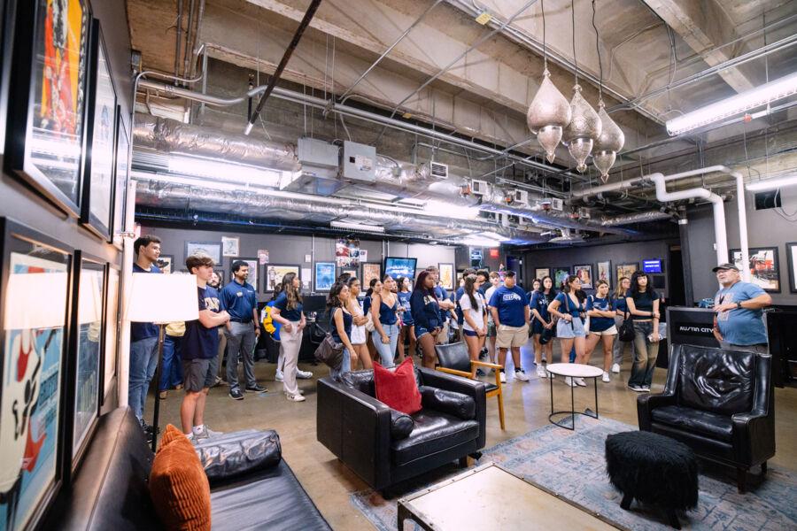 Students listen to the history and stories that occurred back stage where they stood