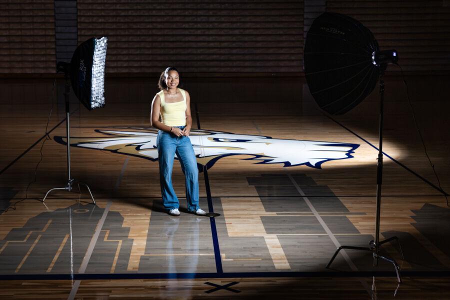 Suni Davis poses on the gym floor of the RAC