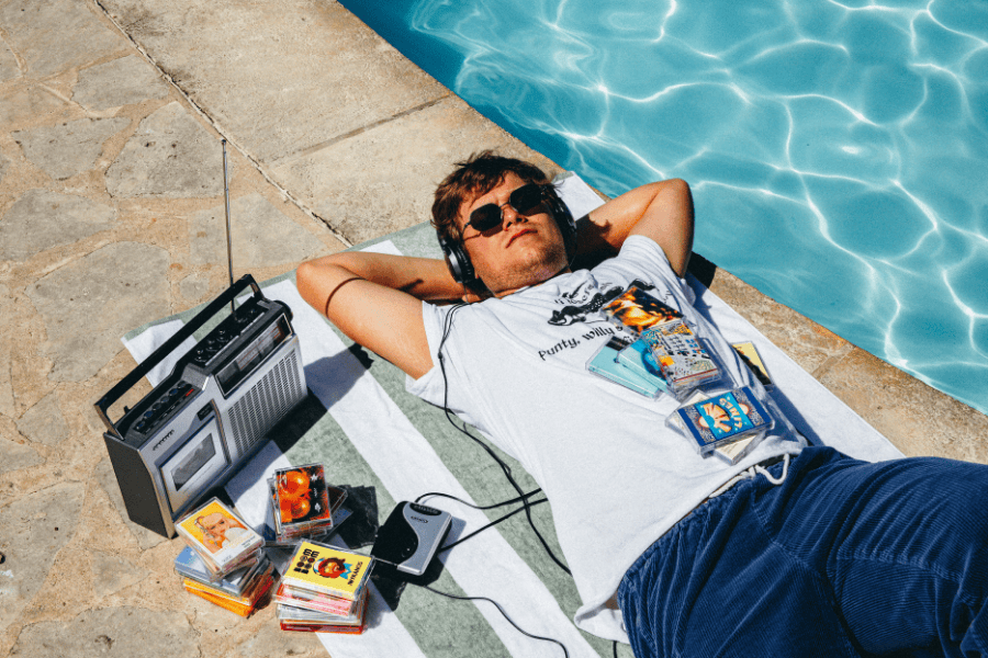 Chandler Christopher poses at the Austin Motel for his record label