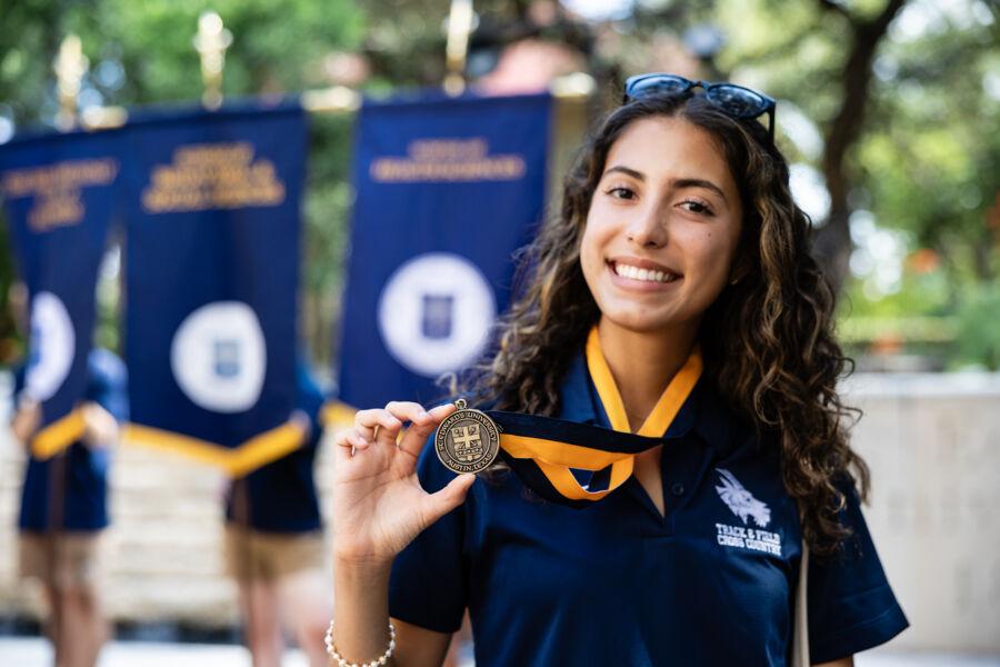 Freshman student poses for a photo during the Legacy Walk.