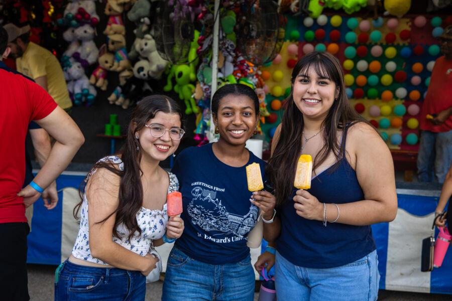 Students pose for a group photo during the block party at Anchors Weekend.
