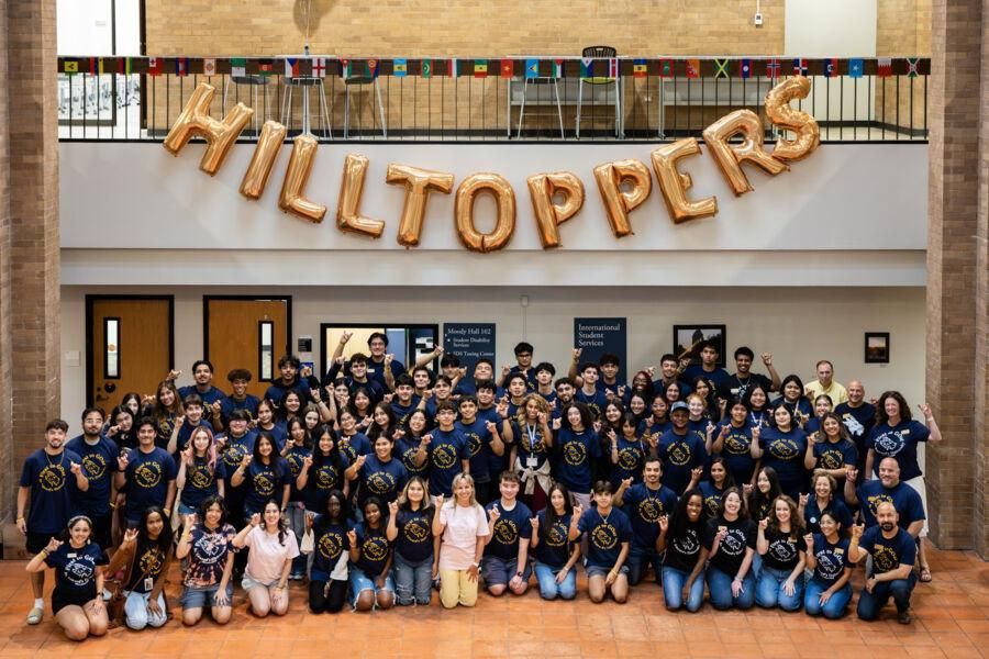 Students pose for a group photo at the First to Goat event in Moody Hall.