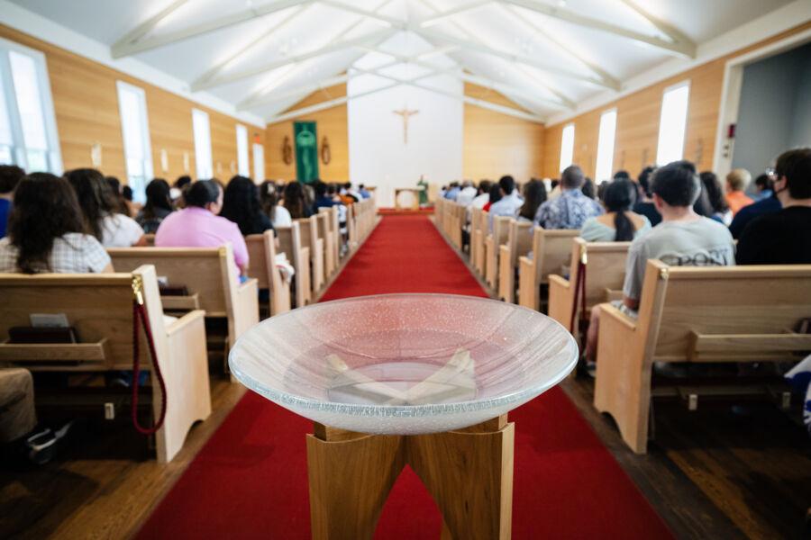 Hilltoppers gather for the Mass of Welcome inside of the Our Lady Queen of Peace Chapel.