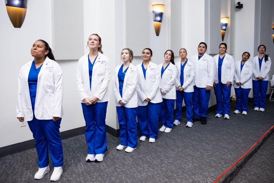 Inaugural Nursing cohort at the first-ever White Coat Ceremony in Jones Auditorium in Fall 2024.